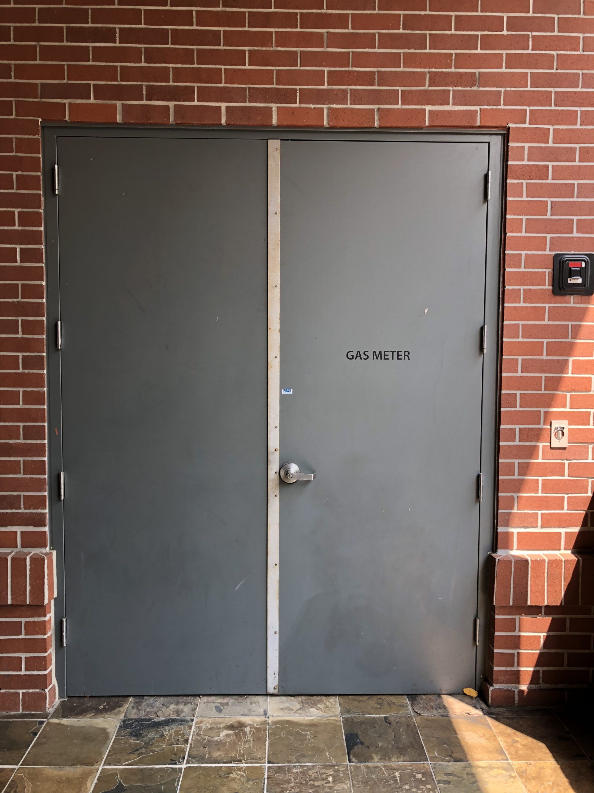 Metal Door Pic 1 commercial door installed to brick building in plymouth ca