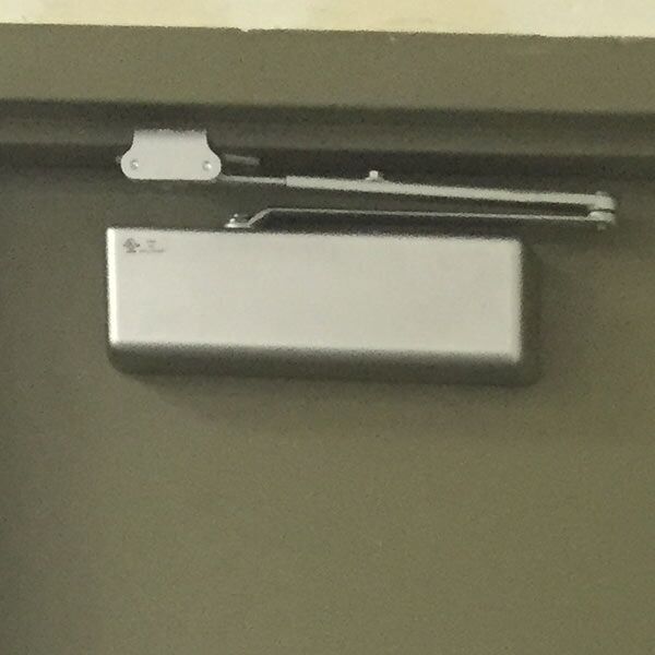 LCN door closer hardware installed