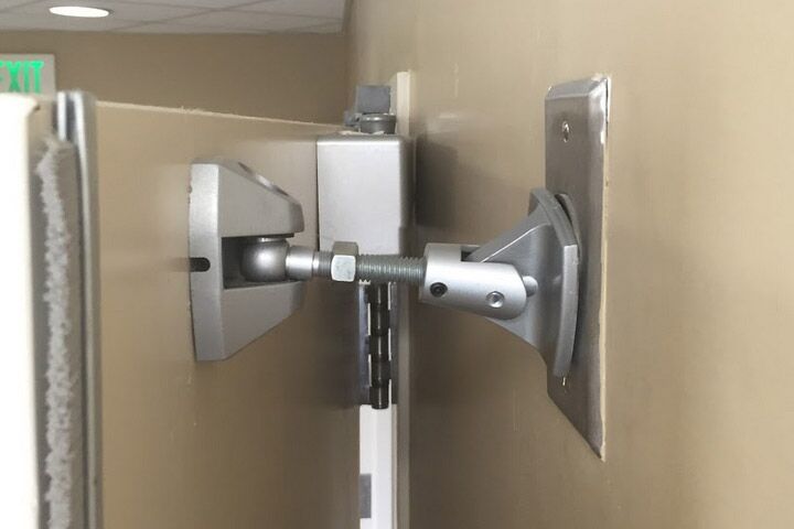 how do you make a heavy door easier to open?