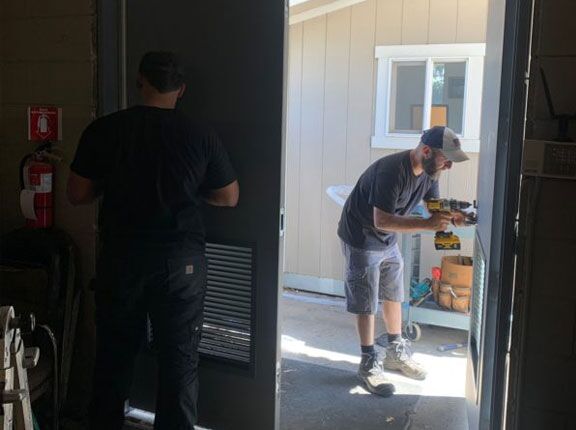 our dedicated pros are working on a new door installation