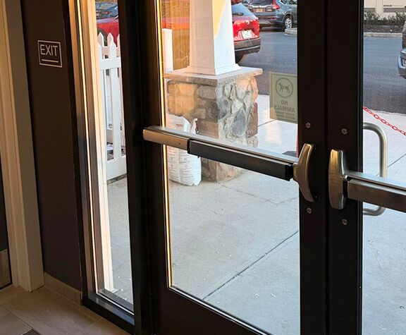 one of the many storefront door repairs in Escalon done by our experts